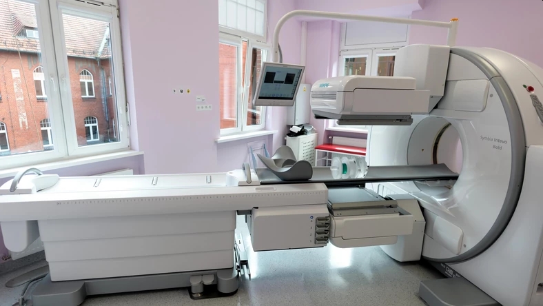 MRI machine in hospital room, ready to perform imaging of patient.